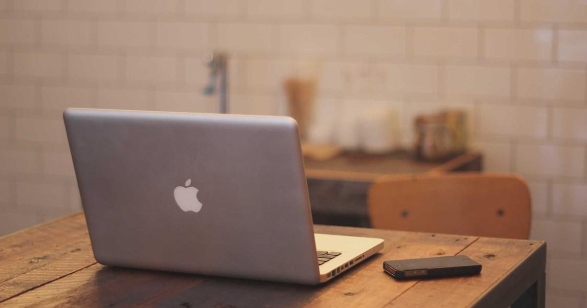 Modern device on a desk representing a mobile fitness app