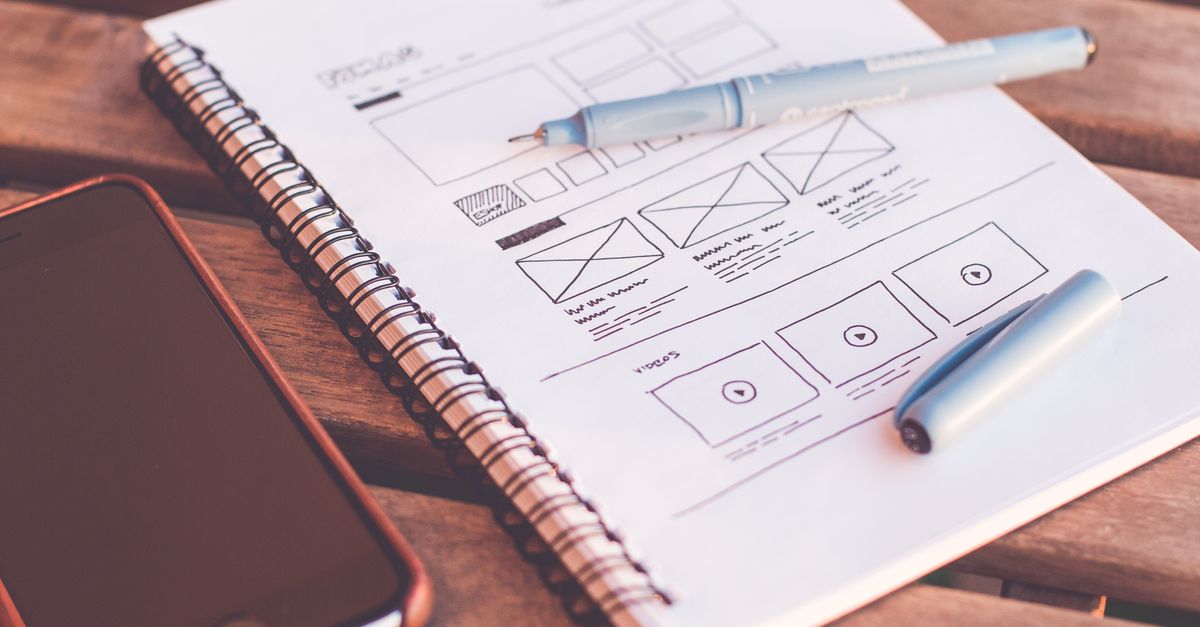 UI/UX designer creating wireframes and a design system for a web and mobile product